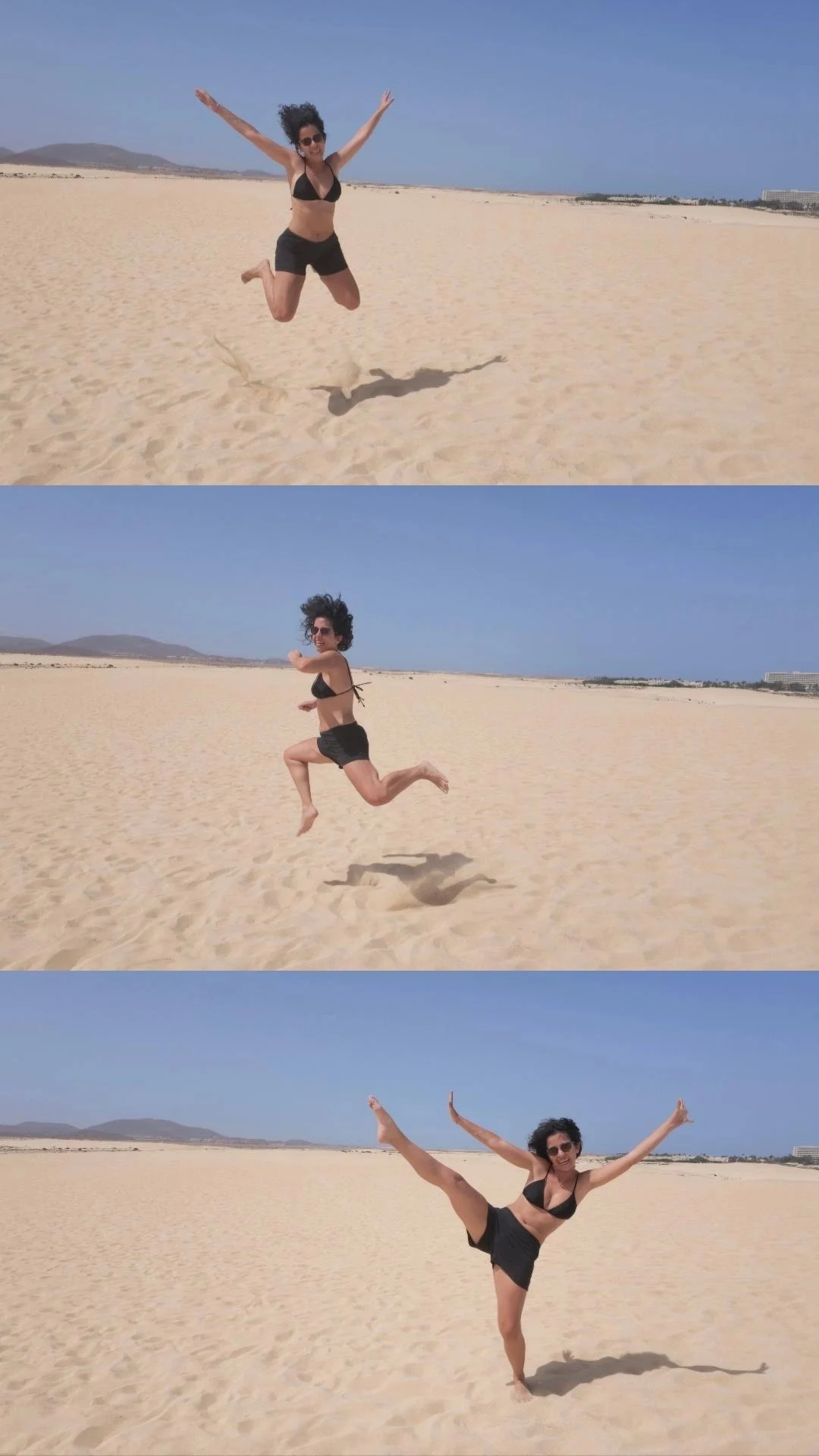 Three jumps over the pale sand of the Corralejo dunes under a clear blue sky