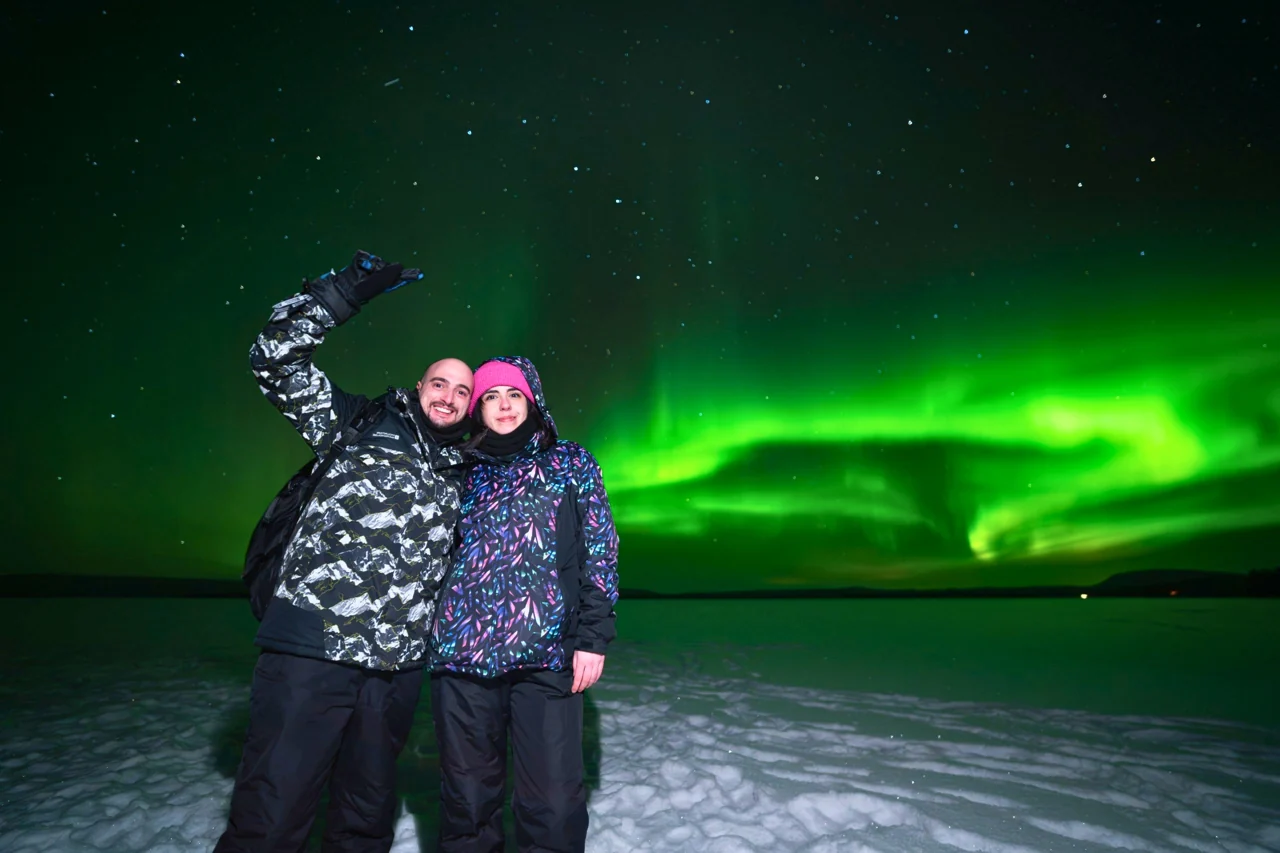 Valentina and Ivan sharing a moment under the northern lights